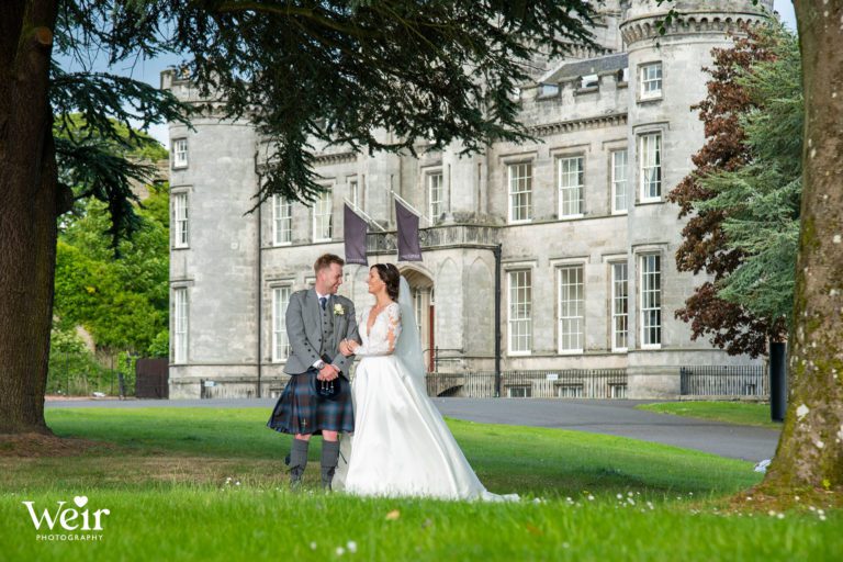 Bride and Groom in front of Airth Castle