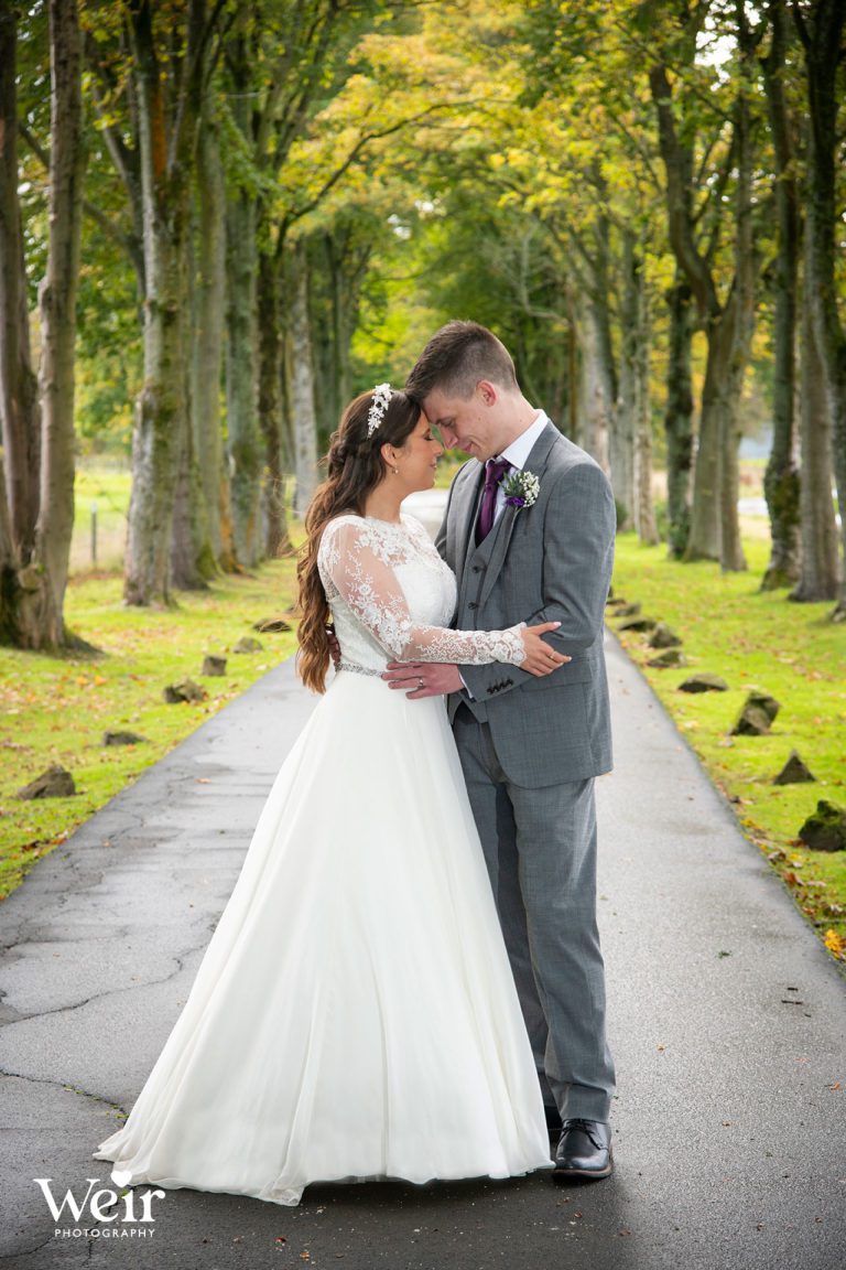 Bride and Groom in the driveway to Glenbervie House